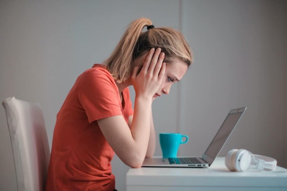 Young woman sitting at computer