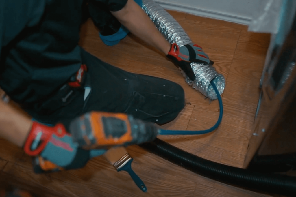 Cleaning a Dryer Vent with a Power Brush Cleaning