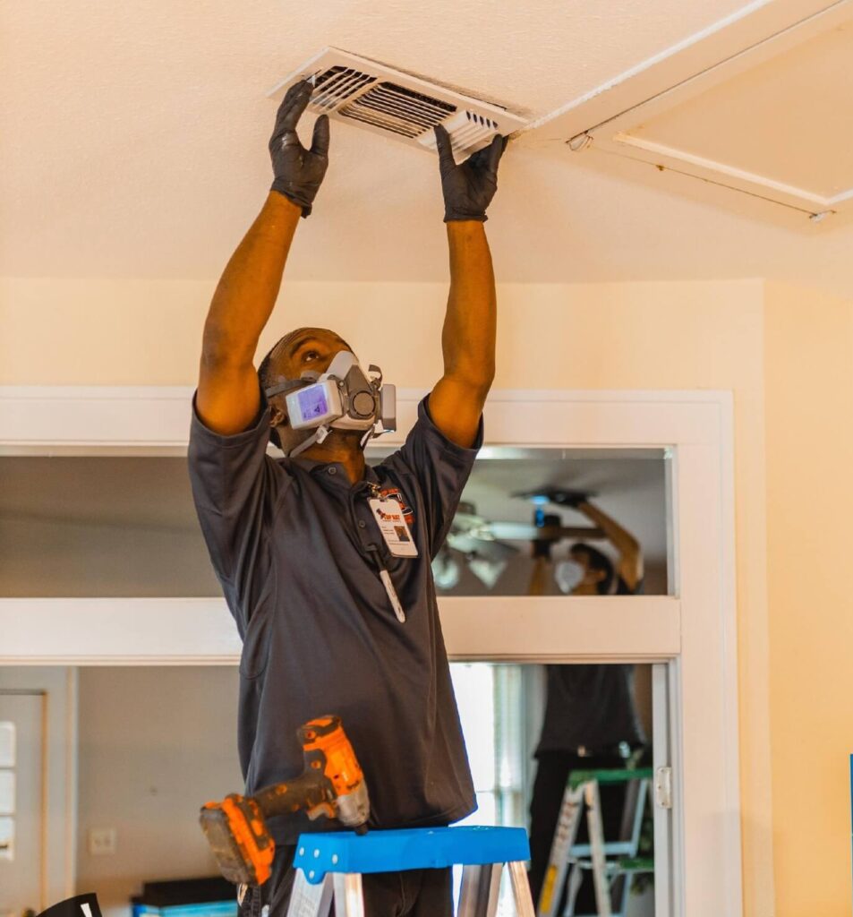 Top Hat Technician removes a home Air Vent cover for Cleaning